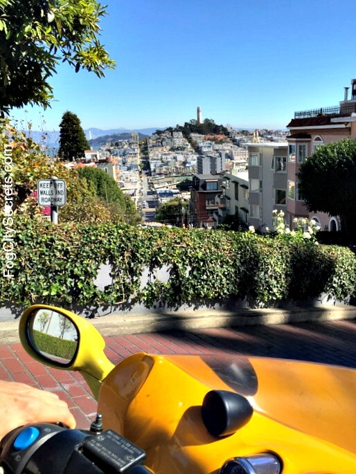 View of Coit Tower, Driving Down Lombard Street in Our Go Car going down lombard street in a go car, view of coit tower