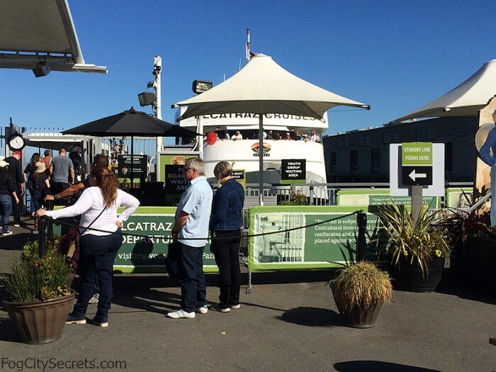 People waiting in the standby line for day tour ferry to Alcatraz.