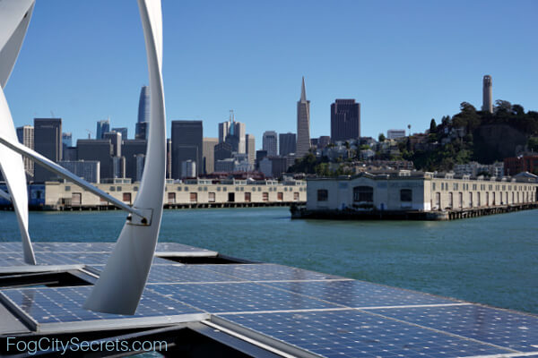 Alcatraz ferry leaving Pier 33, city view