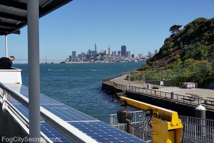 Ferry docking at Alcatraz, San Francisco skyline