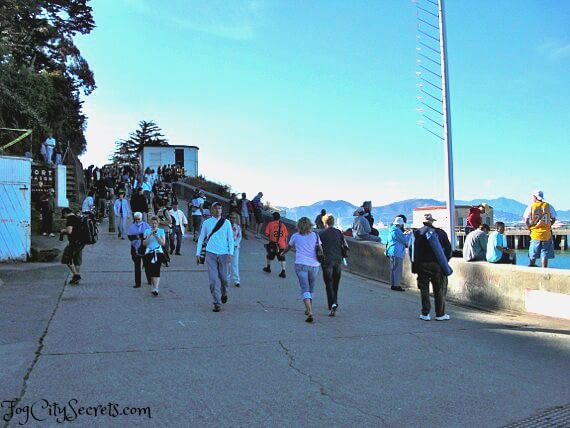 People heading up hill at Fort Mason for best Blue Angels view, SF Fleet Week