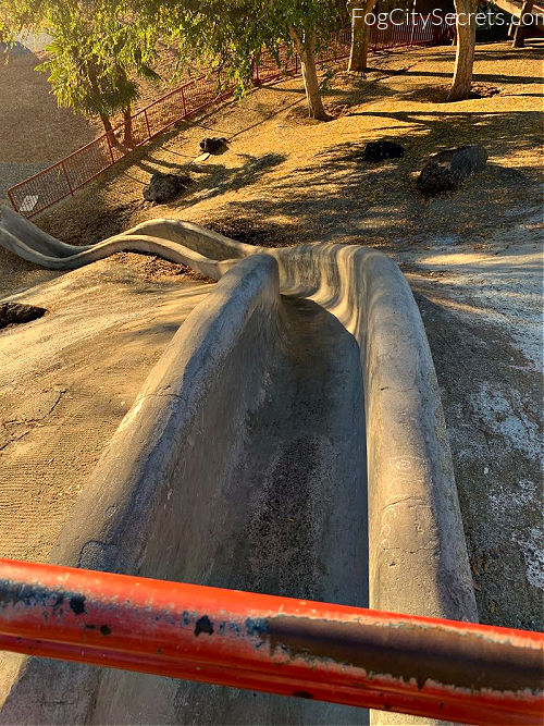 Single cement slide in Brigadoon Park in  San Jose