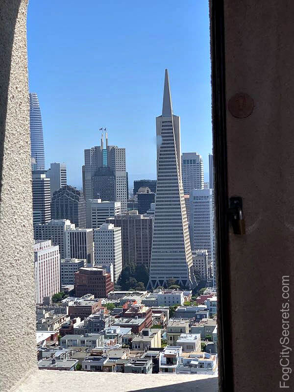 Coit Tower window view of downtown SF