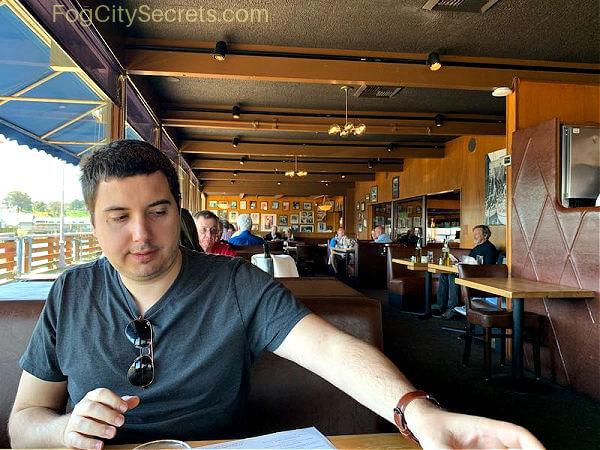 Man eating at Scomas restaurant in San Francisco Man eating at Scomas restaurant in San Francisco