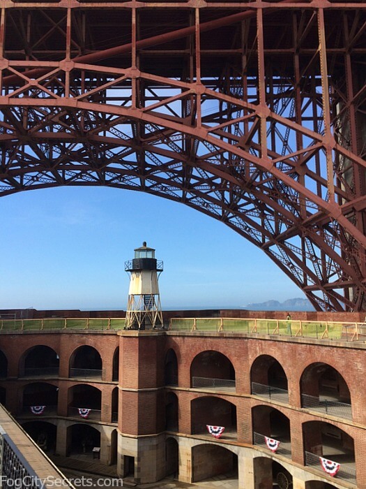 Courtyard and roof of Fort Point, with the steel arch of the Golden Gate Bridge above. Courtyard and roof of Fort Point, with the steel arch of the Golden Gate Bridge above.