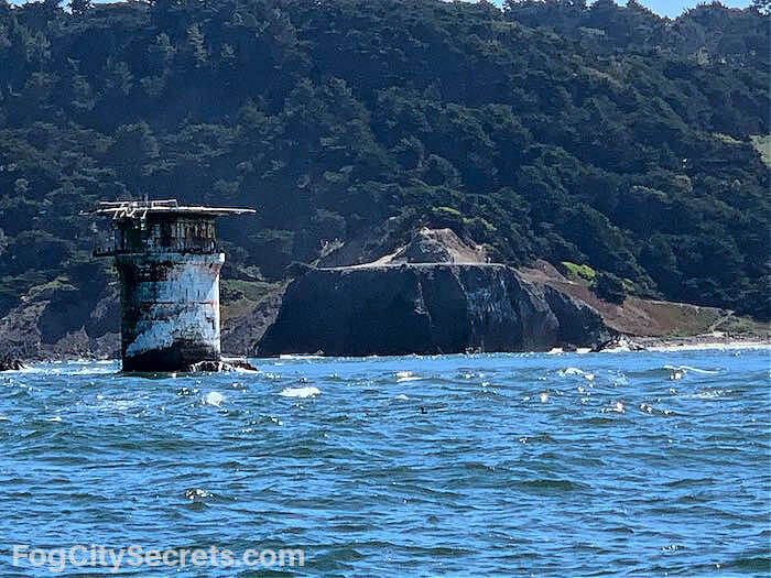 Lands End POint and Mile Rocks Lighthouse view from water Lands End POint and Mile Rocks Lighthouse view from water