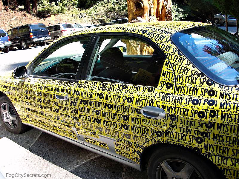 Car covered in Mystery Spot bumper stickers Car covered in Mystery Spot bumper stickers