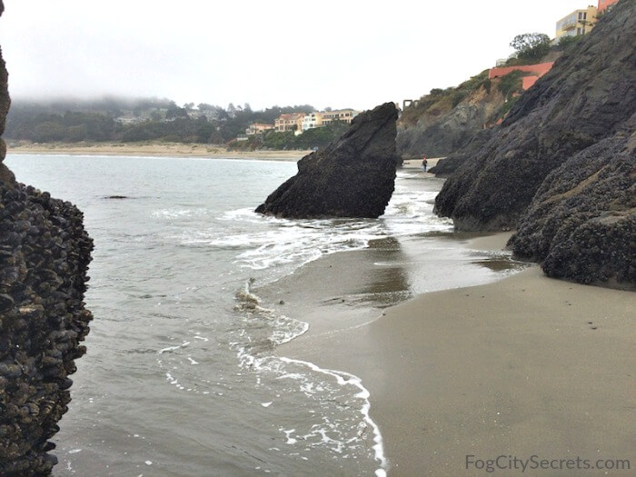 View of Baker Beach from rocks at China Beach at low tide. View of Baker Beach from rocks at China Beach at low tide.