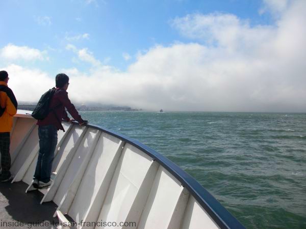 San Francisco bay cruise heading for foggy bridge