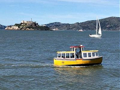 The little yellow Water Taxi out on San Francisco Bay The little yellow Water Taxi out on San Francisco Bay