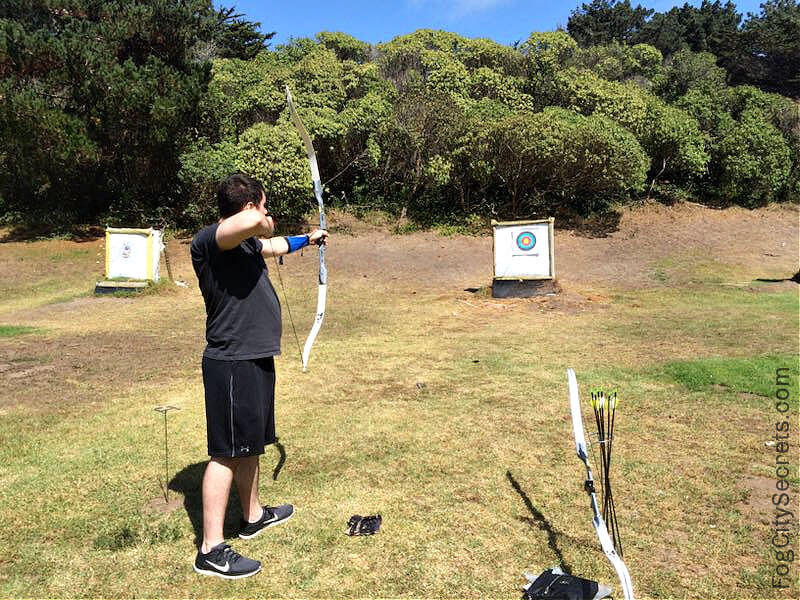 Man shooting an arrow at target Golden Gate Park Man shooting an arrow at target Golden Gate Park