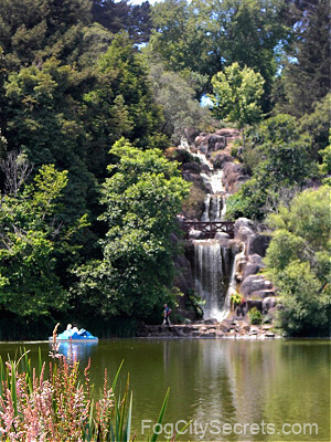 Stow Lake, sailing past waterfall on paddle boat