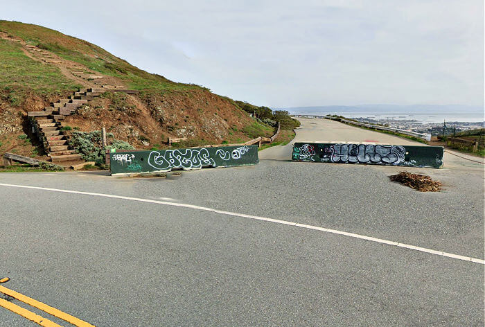 Road blocked off with a few parking spaces Twin Peaks