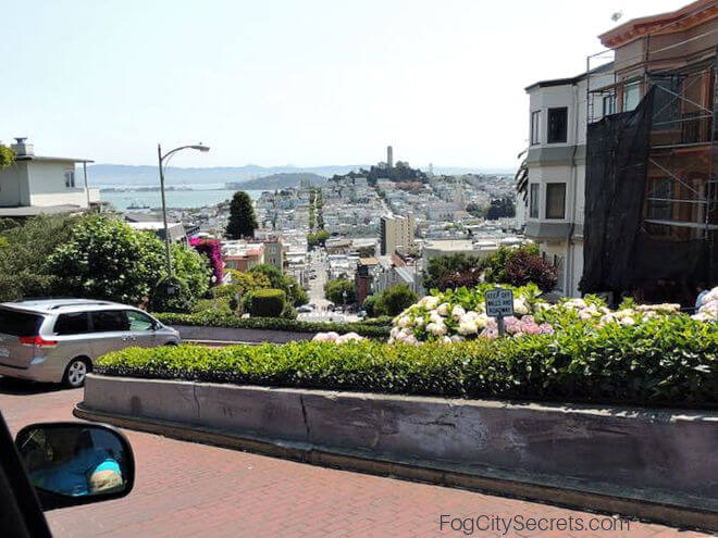 View of Coit Tower  driving down Lombard Street San Francisco View of Coit Tower  driving down Lombard Street San Francisco