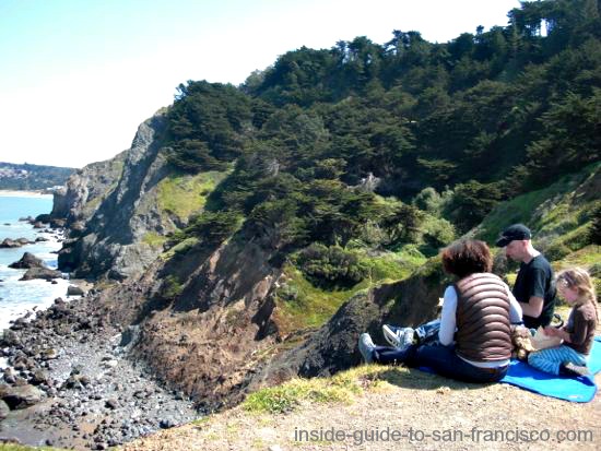 Family having a picnic at Lands End Point