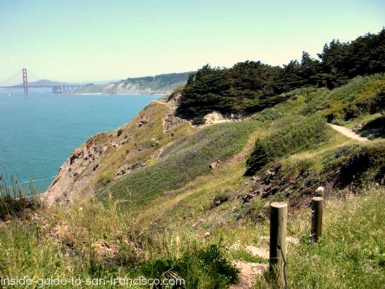 Lands End Coastal Trail winds along cliff edge, bridge view